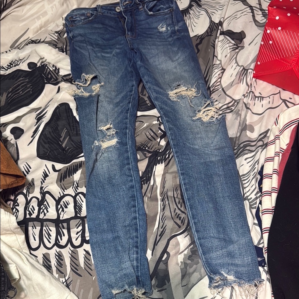Distressed Blue Jeans